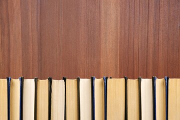 Set of hardcover books row on background. Education concept. Books border.