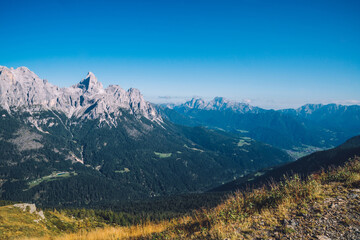 Scenery nature landscape of high rock mountains. Peaceful atmosphere and ideal environment for travel. Beautiful Dolomites peaks view from observation viewpoint