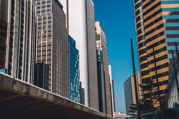 Modern business district of megalopolis with tall skyscrapers and rental commercial apartments,...