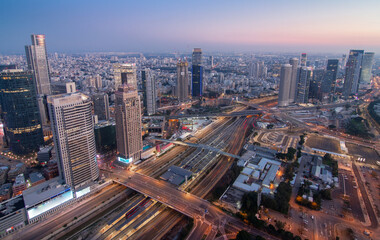 Tel Aviv and Ramat Gan modern aerial panorama. Top evening view above with skyscrapers and highways