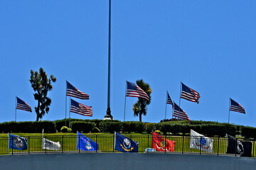 We’ll below the main American Flag staff are smaller American, and military flags, Golden Gate...