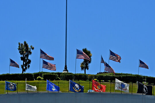 We’ll below the main American Flag staff are smaller American, and military flags, Golden Gate National Cemetery, San Bruno, California