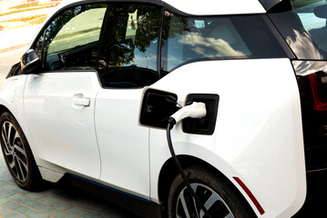 Electric car at the charging station. Ecology. Eco-friendly transport