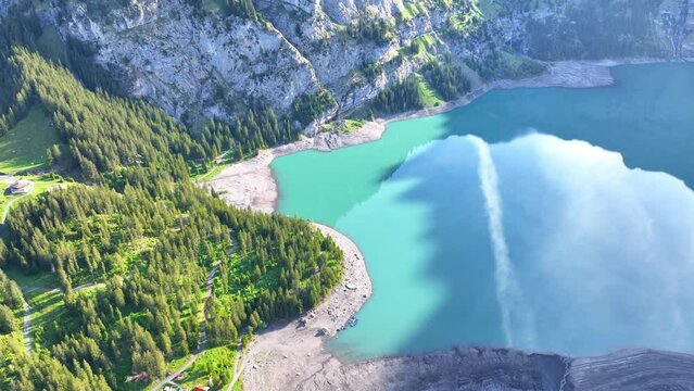 alpine idyllic lake in Swiss Alps, aerial view of turquoise calm lake, peaceful glacial lake in the mountains, crystal clear lake in Switzerland, mountain wilderness