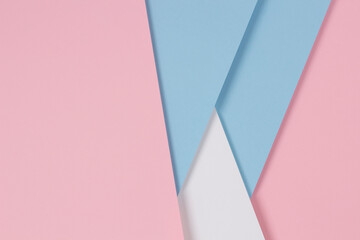 Abstract geometric pastel color paper texture background with light blue, pink and white colors