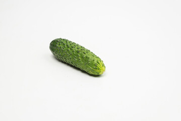 Fresh green cucomber isolated on white background.