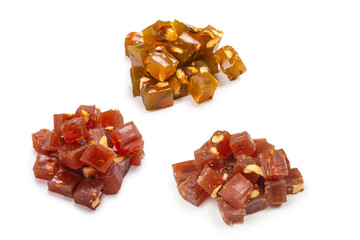 Turkish traditional delight with nuts isolated on white background.