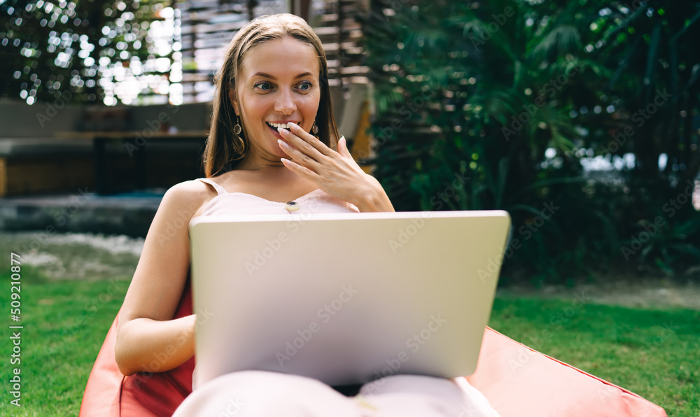 Poster shocked female freelancer surprised with received web results via text email message on laptop compu