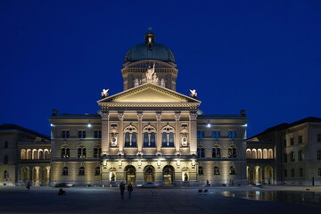 Fototapeta na wymiar View of Swiss Parliament building at night. Bern, Switzerland - June 2022