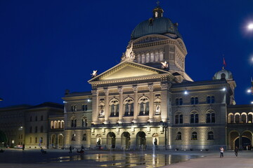 Fototapeta na wymiar View of Swiss Parliament building at night. Bern, Switzerland - June 2022