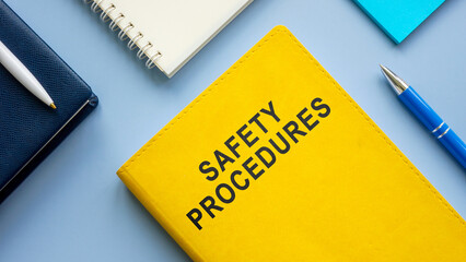 Manual with safety procedures on the table.