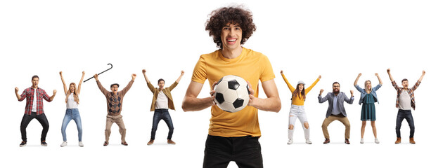 Young man with a football and people cheering in the back