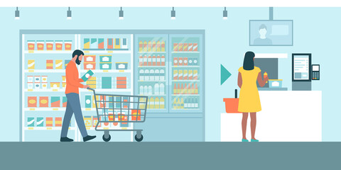 Naklejka na ściany i meble People doing grocery shopping and using a self-checkout