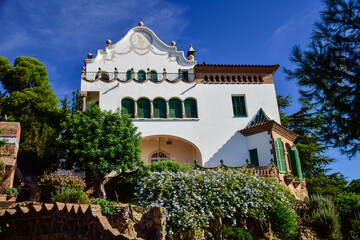 Barcelona, Spain - October 3, 2019: Beautiful white house in Guell Park by architect Gaudi on...