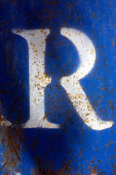 Written Wording in Distressed State Typography Advertising Letter R