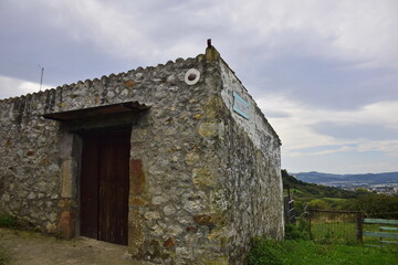 An old building made of stone and concrete. The Way of St. James, Northern Route, Spain