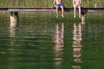 children on a pier