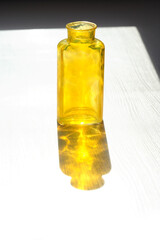 Empty Yellow Bottle