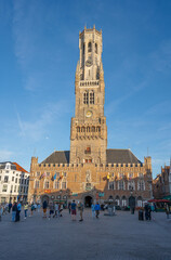 Fototapeta na wymiar Bruges Belgium - The Belfry of Bruges located in the Market Square 