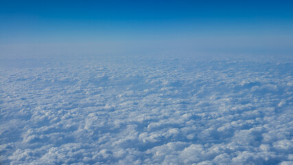 Naklejka na ściany i meble Beautiful cloudscape with blue sky. Wonderful panorama above white clouds