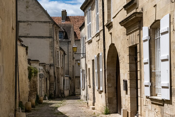 Senlis, medieval city in France, typical street with ancient houses
