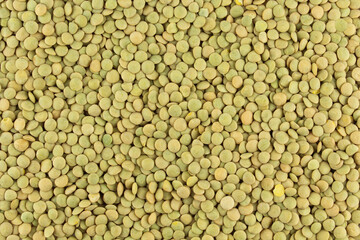 Uncooked lentils background texture. Healthy nutritious food