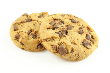 Two homemade chocolate chip cookies isolated on white background