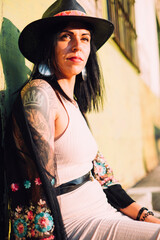 Young tattooed woman summer portrait - 509242460