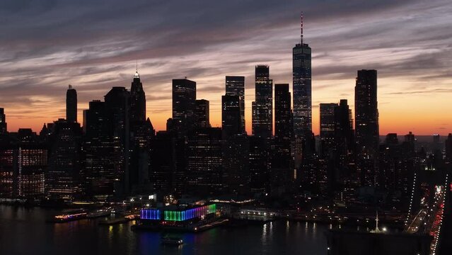 alt view of downtown NYC sunset descending revealing Brooklyn Bridge