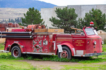 Vintage red fire truck on the farm in Canada