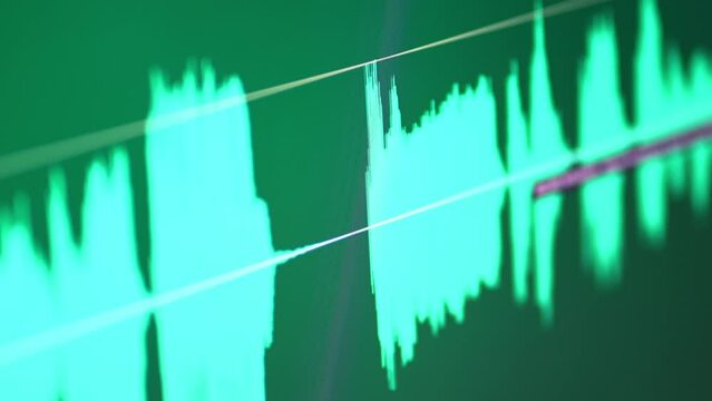 Audio specturm green color. Recording studio. Computer screen. 4K