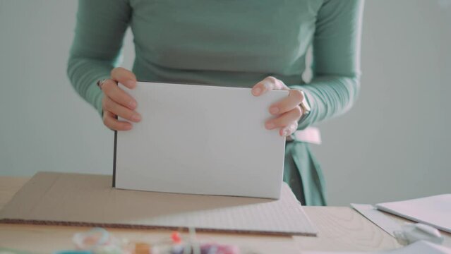 person with a measuring tape