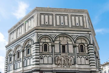 The octagonal Florence Baptistery, also known as the Baptistery of Saint John, one of the oldest buildings in the city, Florence city center, Tuscany region, Italy