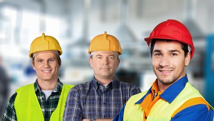 Confidently standing industrial workers, concept of workforce, occupation and safety