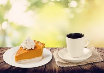 Espresso coffee in a porcelain cup and a cake