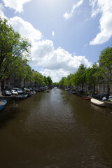 Fototapeta na wymiar Beautiful Gracht (town canal) in the city of Amsterdam