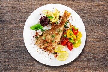 Tasty fresh fish in a restaurant for family dinner.