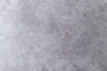 The texture of the stone wall.Small cracks on the concrete wall.