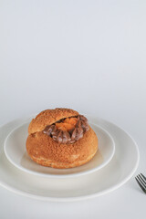 Delicious homemade choux pastry with custard and Marian Plum or Mayongchid. on white background