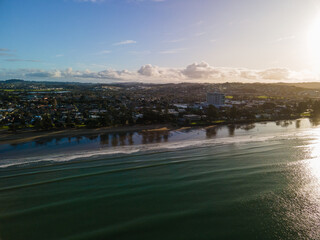 Sunset along Orewa beach on New Zealand's Hibiscus coast