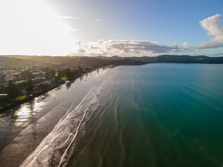 Sunset along Orewa beach on New Zealand's Hibiscus coast