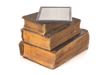 e-book on stack of worn vintage books on white background.