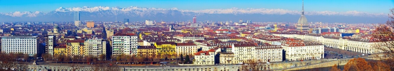 Fototapeta premium Image of european city Turin old buildings and mountains, Italy