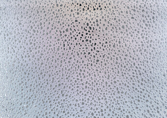 Silver sequins sparkling background. Texture or glitter background.