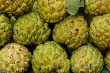 Custard apple fruits, Annona reticulata, are on display for sale at New Market area, Kolkata, West Bengal, India.