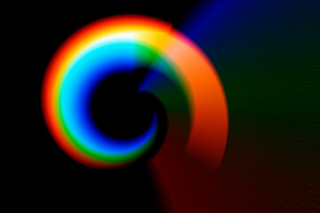 Abstract black background with glowing neon lines.