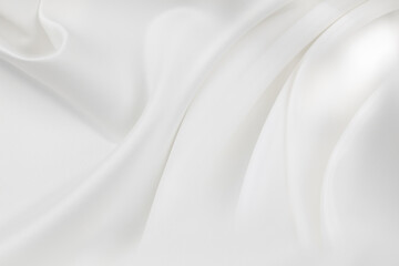 Close-up of rippled white silk fabric texture background