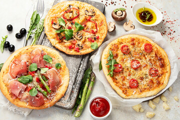 Set of delicious homemade pizzas.