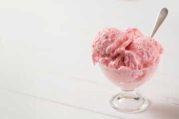 Ice Cream in a Dish with a Spoon