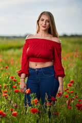 Size plus woman in a poppy field